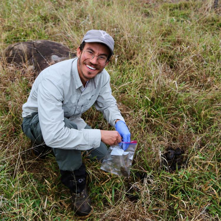Joel collecting dung