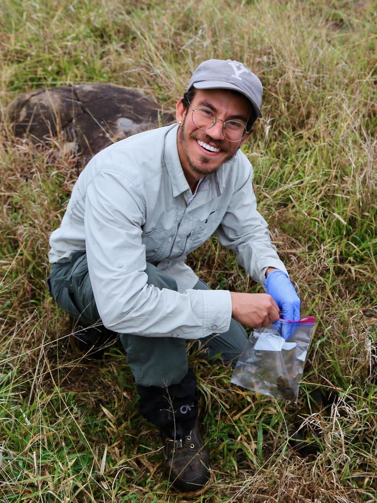 Joel collecting dung